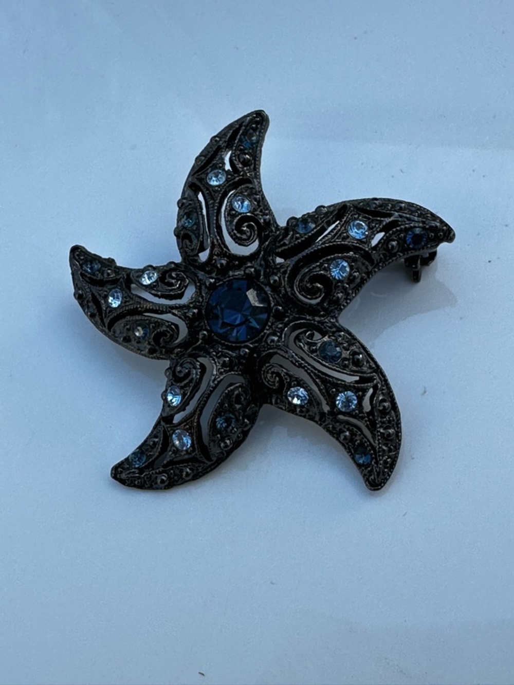 Vintage Rhinestone Starfish Brooch Blue Crystal Sea Star Pin Gunmetal Tone - Picture 3 of 6